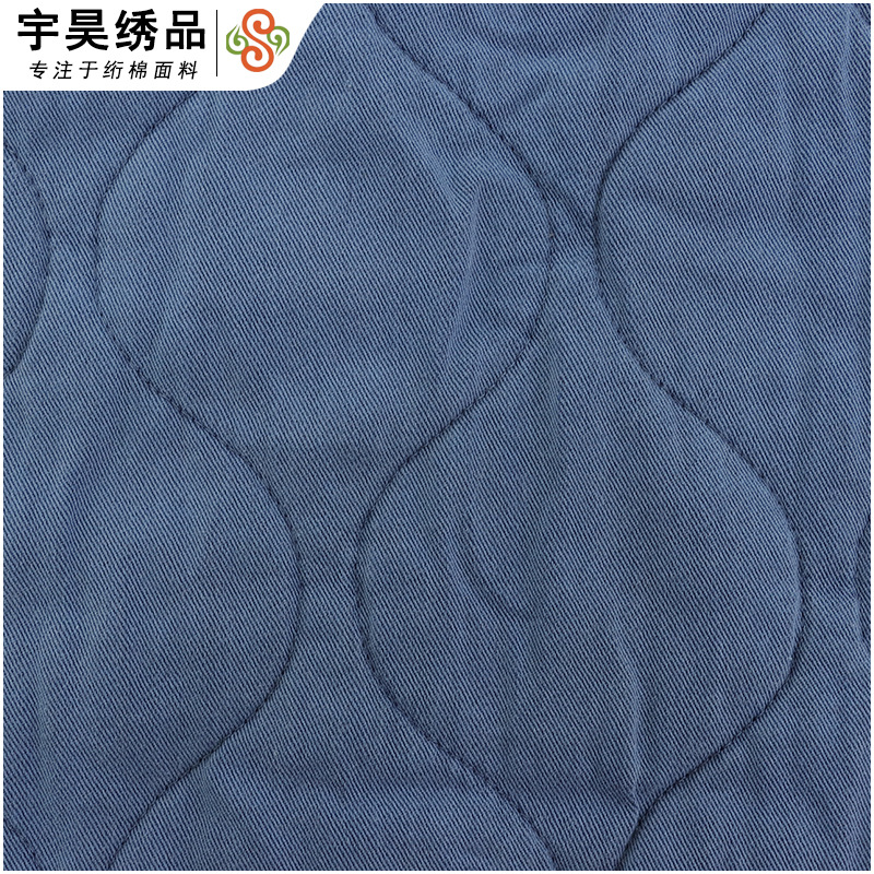 2024新款  斜纹涤棉染色绣花布料  绗棉绗绣绗缝夹棉棉服牛仔面料