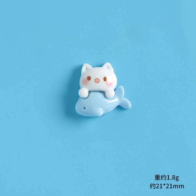 Riding fish kitten