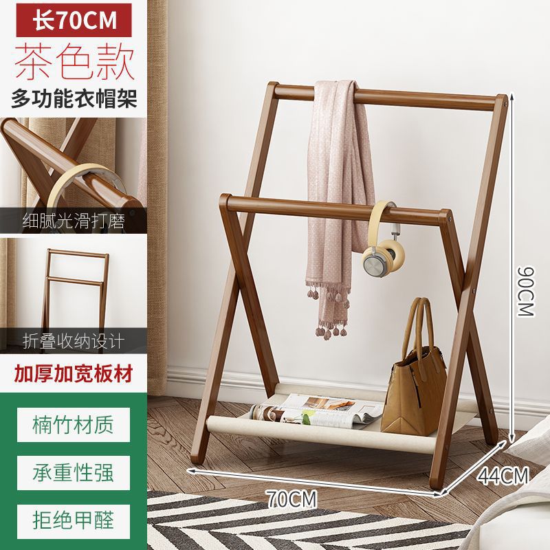 寝室の夜に寝て、ズボンを掛けてハンガーを収納します。