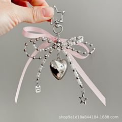 韓国系の甘い真珠の蝶結びは銀の愛のペンダントのキーホルダーのペンダントのかわいい包みのアクセサリーを飾ります。