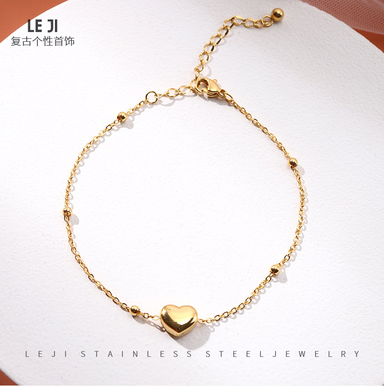 JL-0142: oro elegante en forma de corazón
