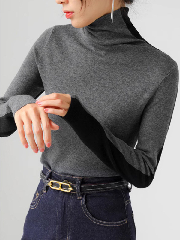 両面にデザイン感のあるウールのニット服を着ています。|undefined