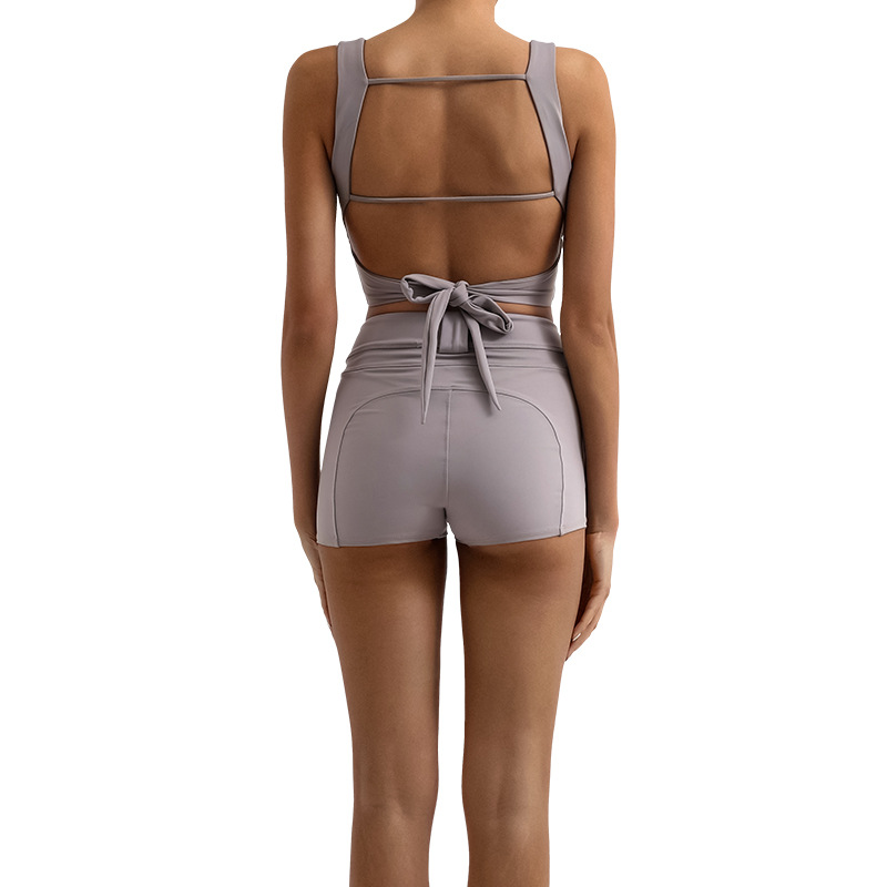 Traje de fitness de yoga transfronterizo de la belleza de la espalda de las mujeres con almohadilla en el pecho chaleco deportivo cintura alta melocotón pantalones cortos de entrenamiento de cadera conjunto de dos piezas