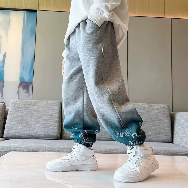 Брюки для мальчиков Весенние и осенние детские спортивные штаны 2024 новые средние и большие мальчики свободные брюки красивые и модные