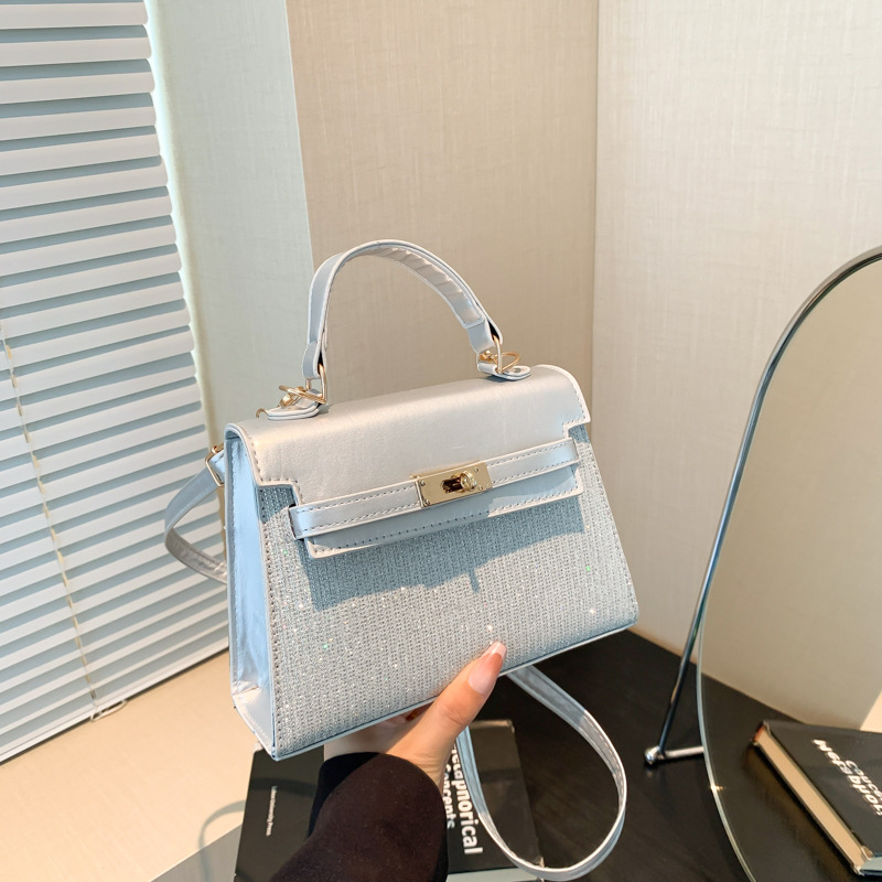 Bolsa pequeña de estilo extranjero para mujeres 2024 nuevo estilo de mano popular coreana de hombro de un solo hombro para viajar sensación de alta calidad bolso Kylie