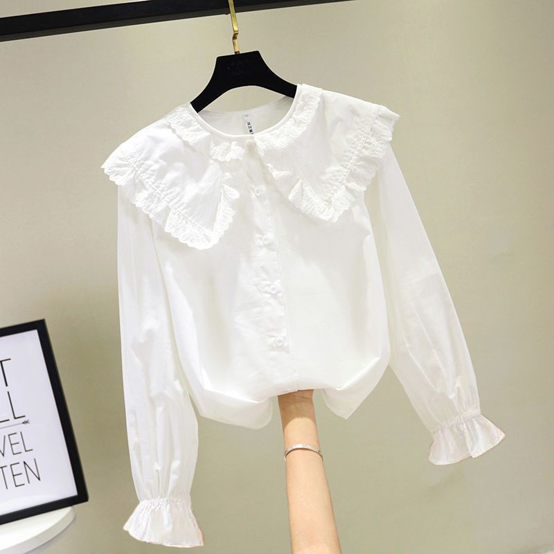 Camisa de primavera y verano para niñas 2023 nuevo estilo coreano estilo occidental camisa blanca de manga larga para niños collar de muñeca de encaje inferior superior