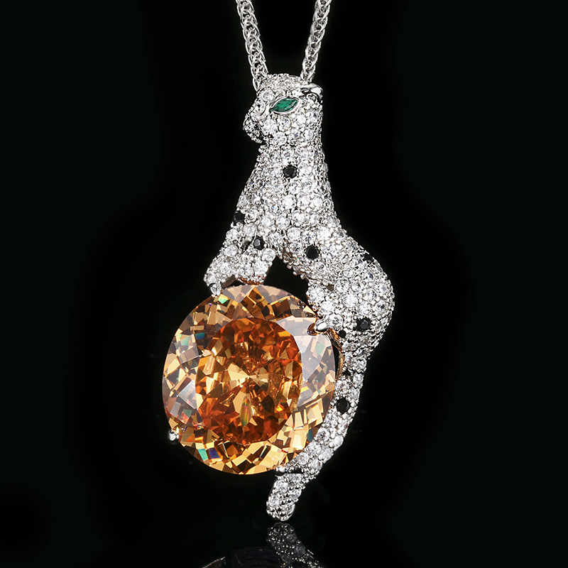 Otoño e invierno nuevo estilo Zhuang Shengsheng joyería simulación nido de pájaro naranja rojo retro leopardo colgante collar piedra principal 18*20