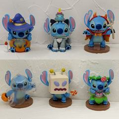 スティッチのおかしな日記シリーズのハロウィンのスティッチの潮は手を遊んで子供の人形のデスクトップの置物の卸売りをします。