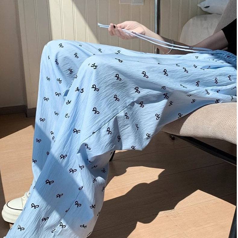 Cuatro estaciones pijamas primavera y otoño dulce delgamiento correa de impresión de arco de verano pantalones largos de invierno pantalones caseros se pueden usar al por mayor