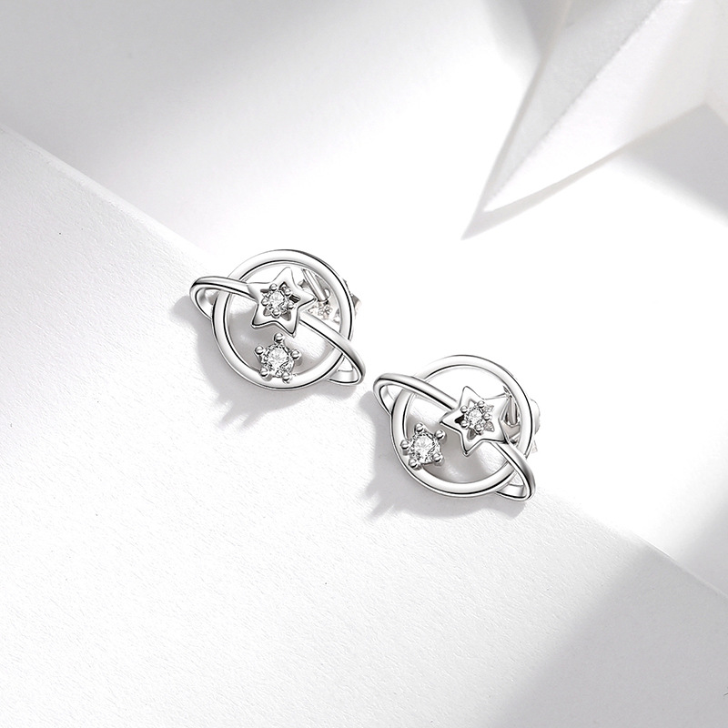 S925 plata esterlina simple estilo japonés y coreano planeta universo estrella Luna pendientes creativos simétricos pendientes personalizados al por mayor