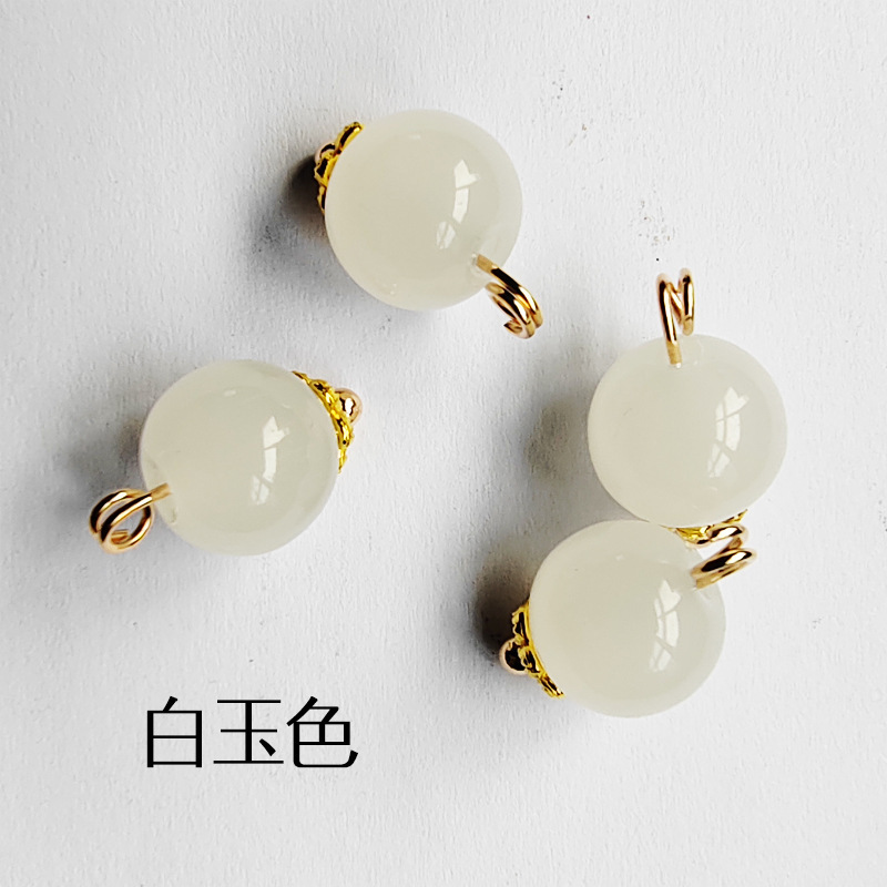 翠玉の唐装の吊り玉をまねて黄玉のシャツの装飾品をまねてチャイナドレスの漢服のボタンのカラー玉の部品の卸売りを掛けます。|undefined
