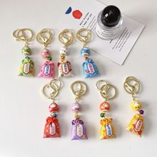 跨境热销梦幻招财猫猫水音铃铛福袋挂件小吊饰日系七色御守开运