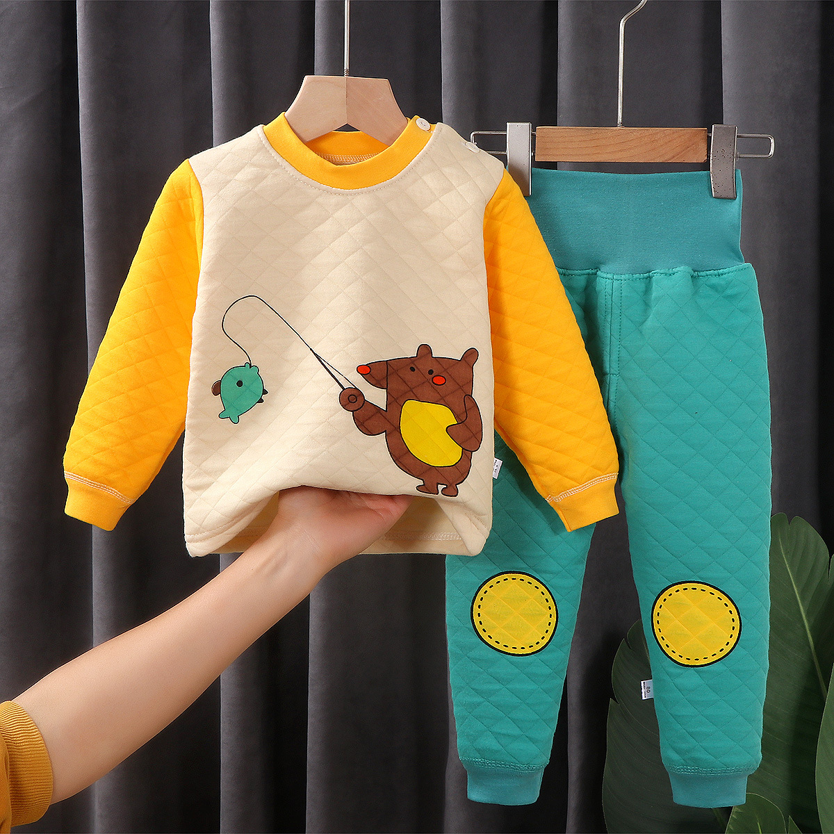 Ropa interior térmica de los niños directos de fábrica traje de tres capas acolchado espesado niños y niñas Otoño e Invierno hogar desgaste Bebé Ropa de los niños