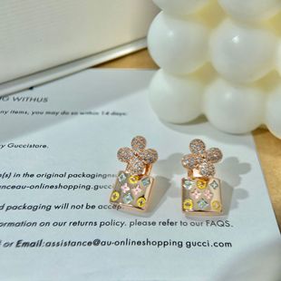 Lujia's new real-shot four-leaf flower zircon earrings, high-end light luxury silver needle earrings, solid small lock bag earrings