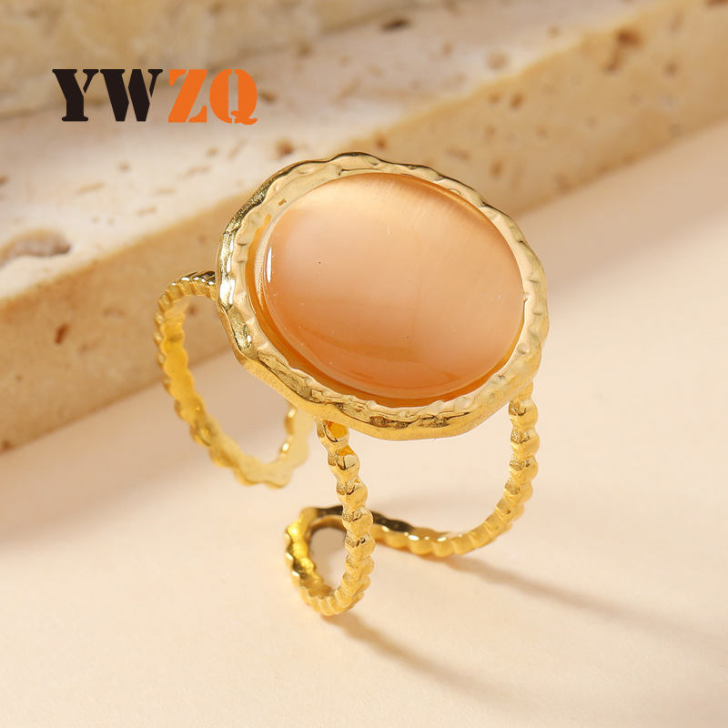Ventas transfronterizas calientes anillo de piedra de ojo de gato temperamento retro mujer geometría redonda abierta anillo de acero de titanio joyería de acero inoxidable
