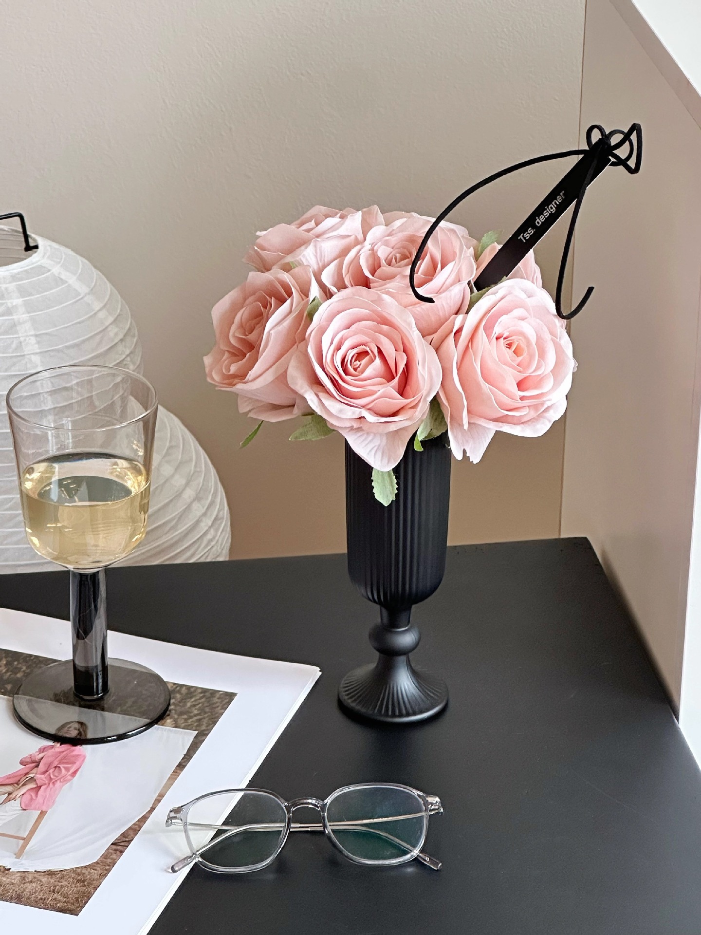 Champagne pink hand holding + tall vase