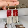 Red earrings pearl with tassels