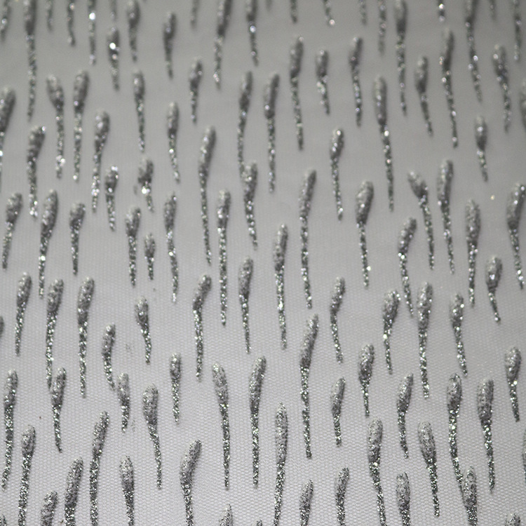 Inventario de tela de malla de moda lluvia oro rociado tela espumosa primavera-verano vestido de moda tela de niña