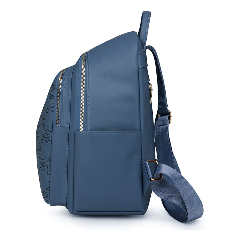 Spot al por mayor 2025 primavera nuevo estilo color sólido mochila para mujer moda urbana viajero ligero mochila escolar