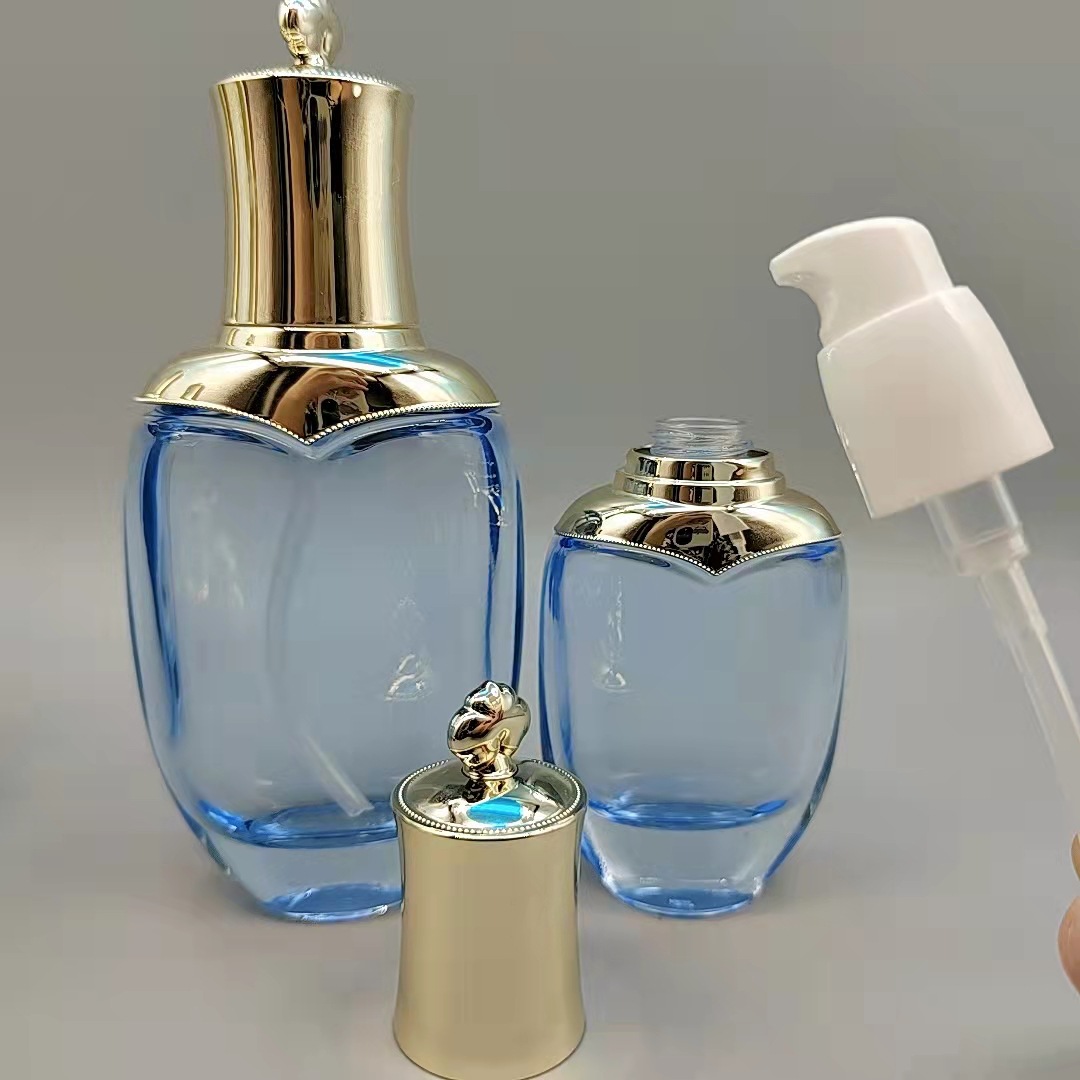 Fábrica en stock suministro de clima Dan mismo estilo conjunto botella de esencia botella de loción botella de pasta de dama botella de vidrio cosmético