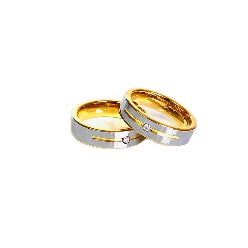 Anillo de tungsteno de acero europeo y americano al por mayor oro CNC incrustado de zircon anillo de pareja de personalidad de la calle universal