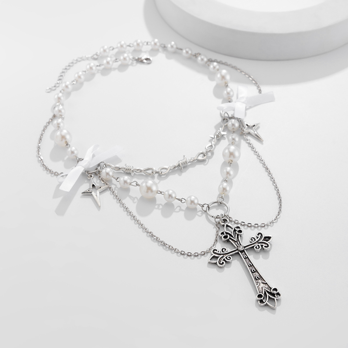 Collana con fiocco metallico a croce e piccola perla artificiale in lega fresca con catena a clavicola_voghion.com