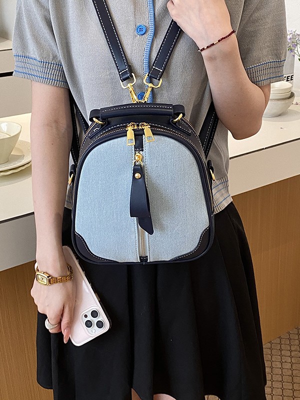Nicho coreano Jeans color contraste mochila mujer 2026 nuevo cross-border multipropósito de alta calidad mochila versátil