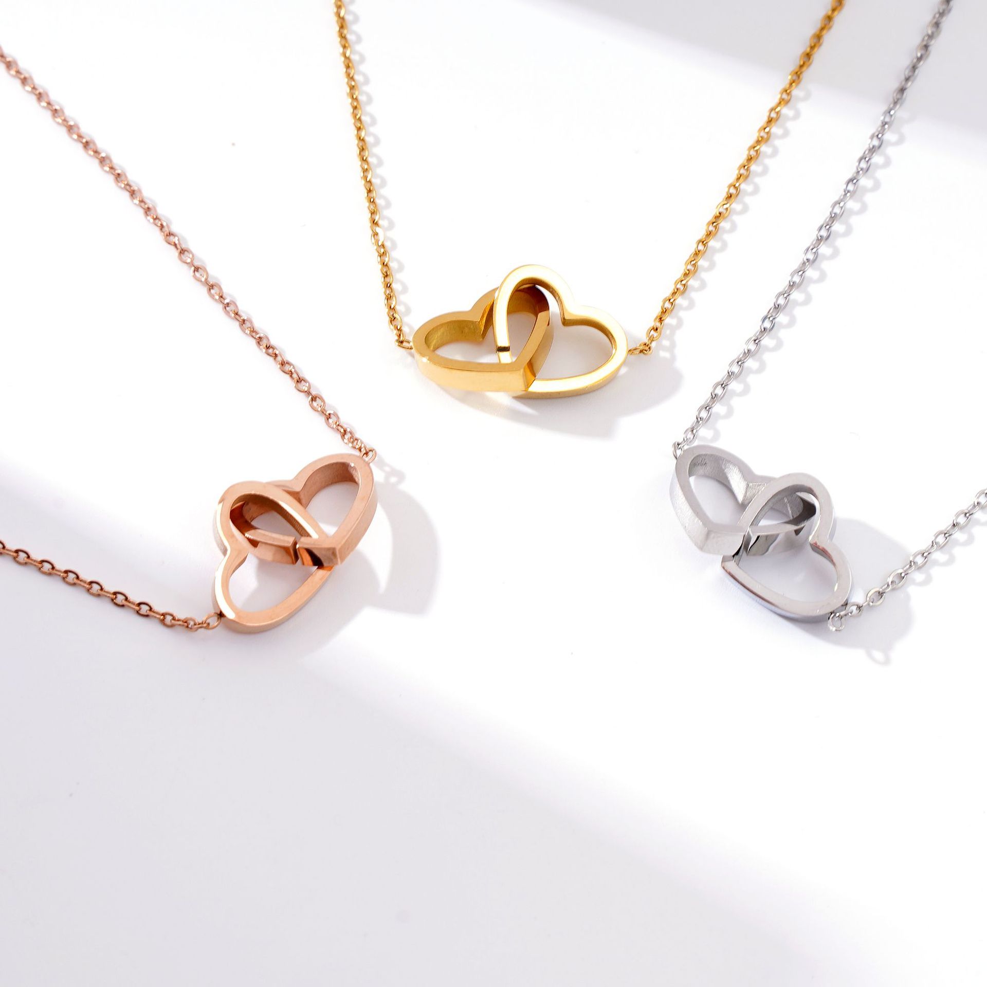 Popular European and American Stainless Steel Double Heart Couple Necklace, Customizable with Engraving, Women's Heart-Shaped Interlocking Double Ring Pendant