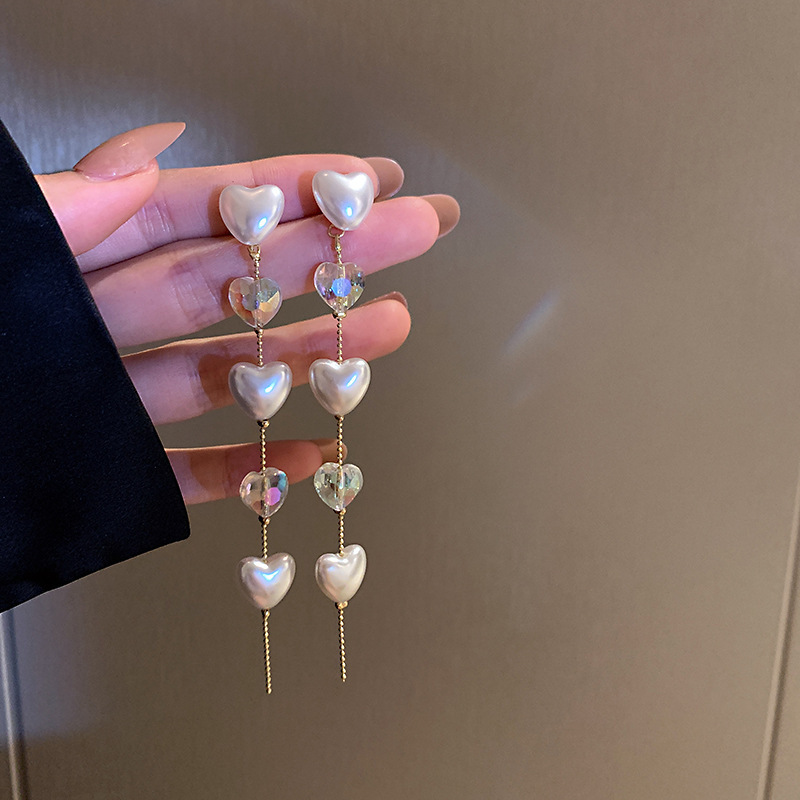 Pendientes de perlas de aceite con goteo de aguja de plata Pendientes de todo fósforo de moda, lujo ligero, joyería retro de alta gama al por mayor, fabricante de Yiwu