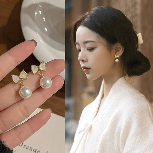 Fashionable butterfly knot pearl earrings for women, new style earrings, niche high-end feel drop earrings, light luxury retro ear clips