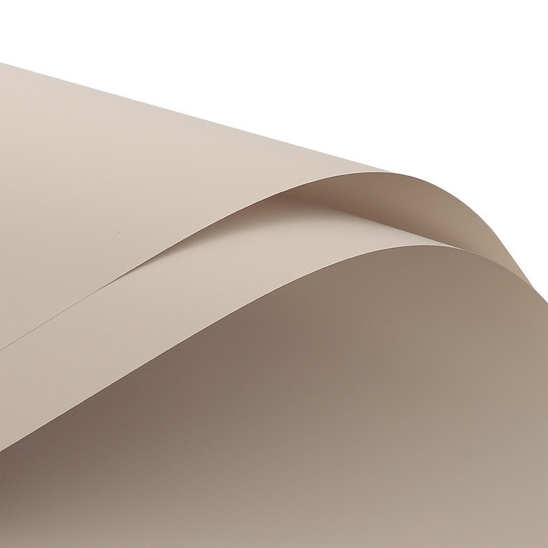 Deca papel de embalaje de flores de color sólido en stock al por mayor papel ouya impermeable material de la tienda de flores papel de embalaje material de bricolaje