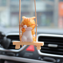 創意新商品は顔を覆います。猫は腰掛けに座っています。