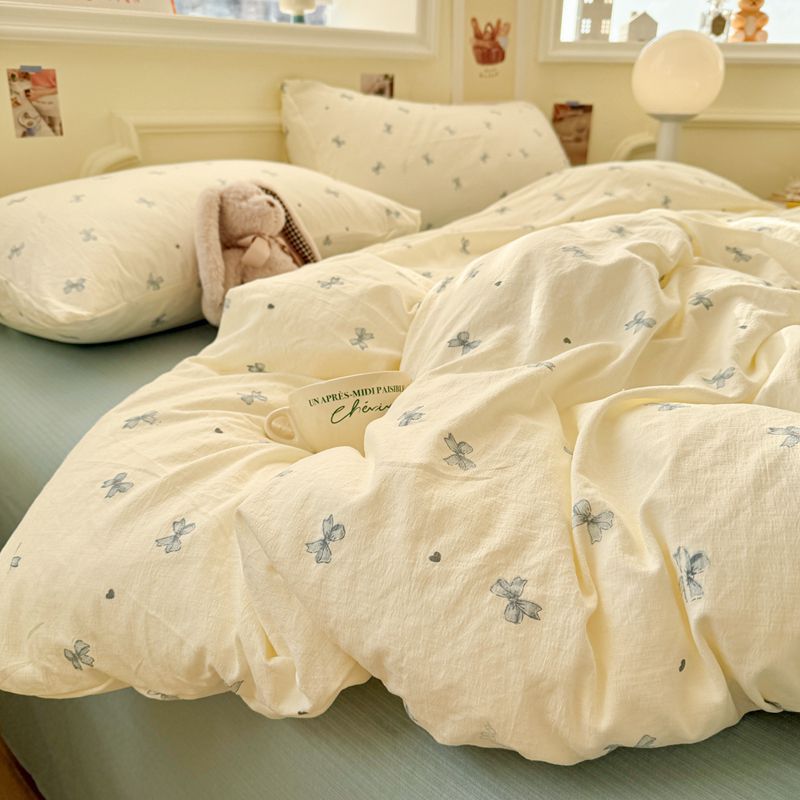 A clase madre y niño cama de doble hilo cuatro piezas de sábanas cubierta dormitorio de estudiantes cubierta de algodón cubierta de tres piezas de ins viento
