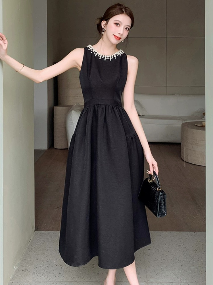 Europa estación chaleco negro vestido de mujer verano lujoso ligero Hepburn vestido de noche con perlas de estilo de alto rendimiento vestido largo