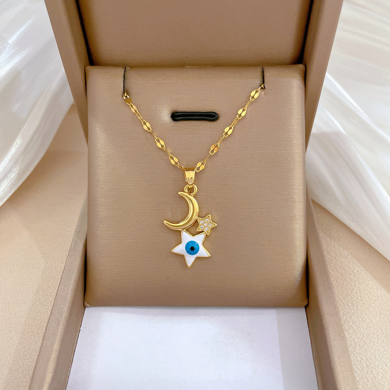 Wholesale Retro Devil'S Eye Star Moon Titanium Steel Copper Inlay Zircon Pendant Necklace display picture 2