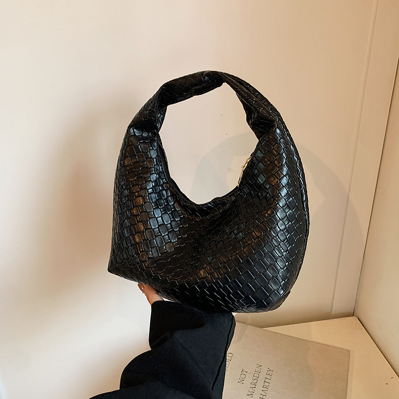 Red retró simple mujer 2024 otoño y invierno nueva moda ocio mochila bolsa trenzada bolso de hombro bajo la axila