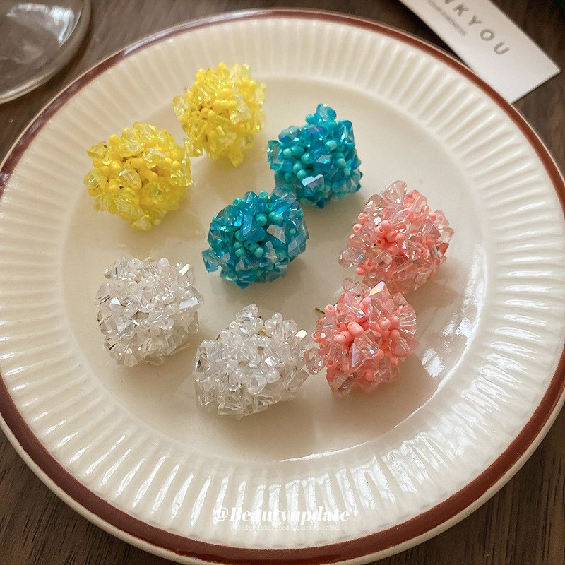 Pendientes de tejido de cristal de flor redonda de aguja de plata Pendientes de todo fósforo de viaje Pendientes de temperamento de moda femenina Sensación de nicho de alto nivel