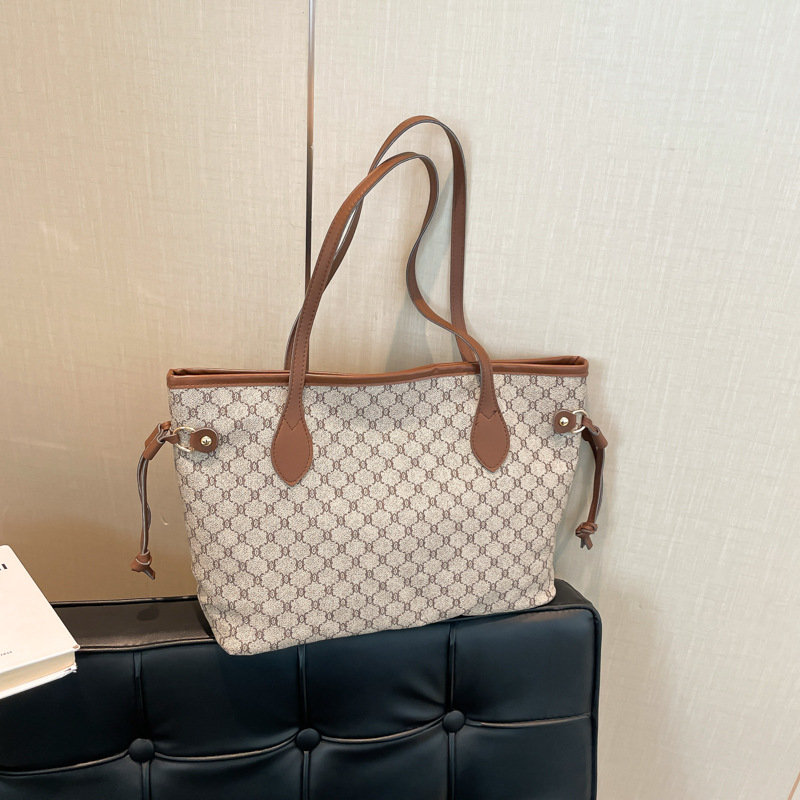 Bolso grande con sensación de relajación 2025 nuevo bolso de hombro impreso de moda de moda bolso de viaje de trabajo bolso de alta capacidad