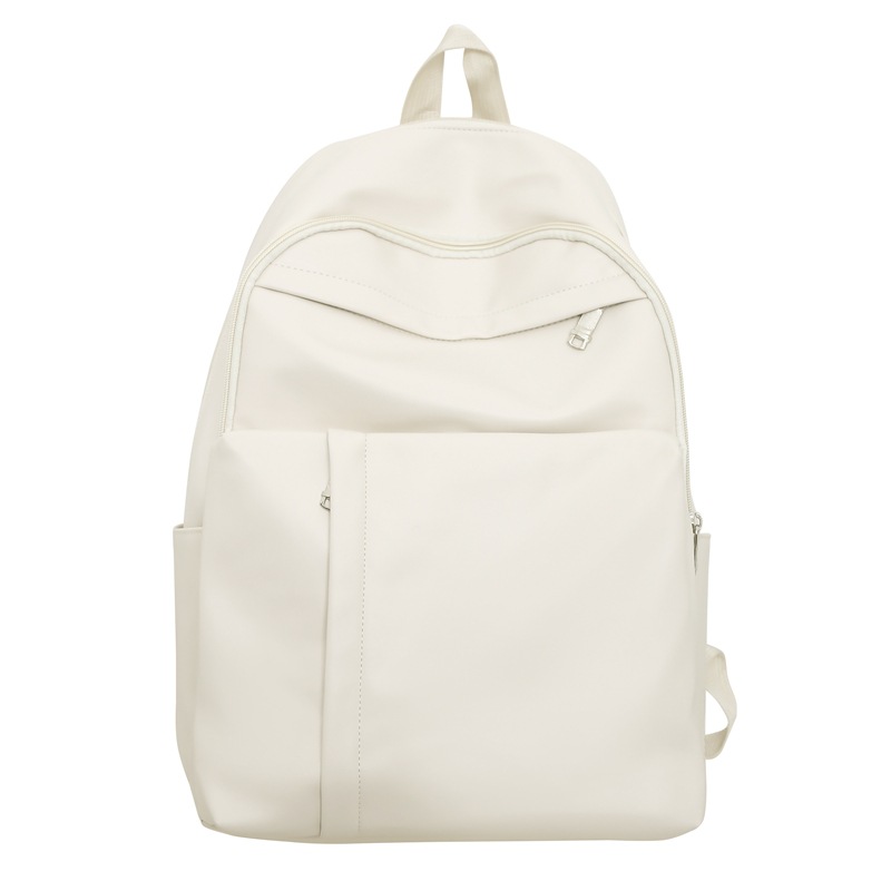 2023 nueva mochila de cuero suave de pareja de gran capacidad casual simple y versátil mochila escolar de computadora de viaje al aire libre al por mayor