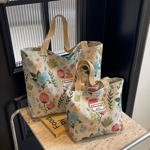 Canvas bag for women, large capacity, hand-held, shoulder or top-handle tote bag with unique design, suitable for office and commuting