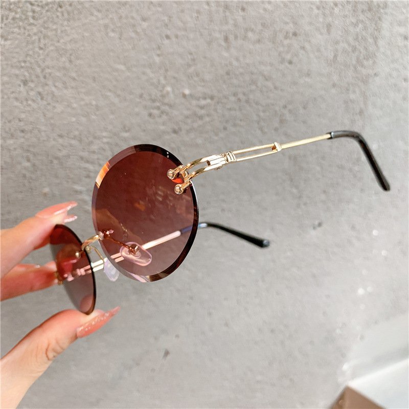 New Sunglasses Women's Oval Gradient Sunglasses Frameless Cutting Edge Trendy Glasses_voghion.com