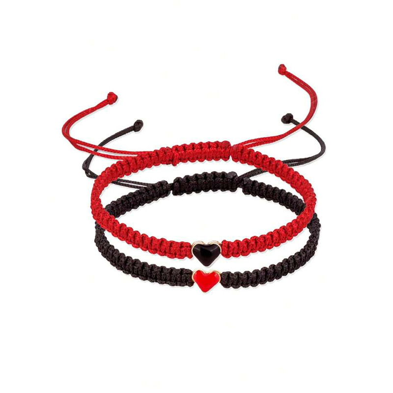 Joyería transfronteriza europea y americana en forma de corazón pulsera tejida a mano pulsera de pareja de amor de las mujeres pulsera de corazón de melocotón blanco y negro al por mayor