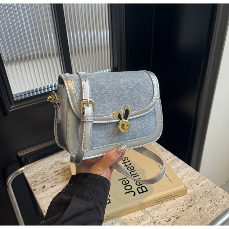Texture denim saddle for women's 2024 summer new contrasting color lock buckle single shoulder bag, niche Western style_voghion.com