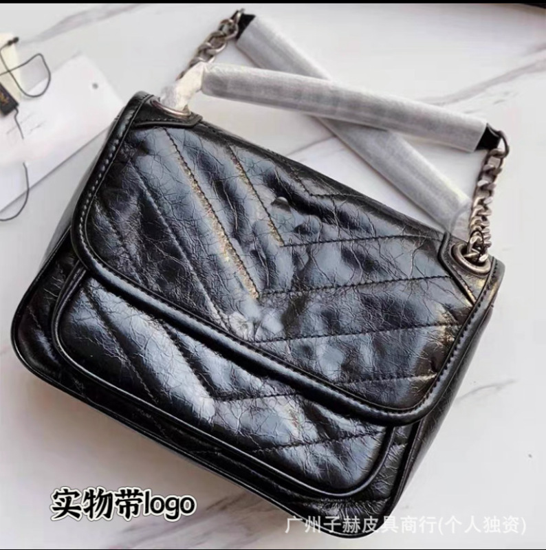 元の工場の高品質の楊林のnikiの中号の郵便番号は本革のチェーンの放浪のカバンを包んで肩を斜めに掛けてわきの下の女性のカバンを掛けます。|undefined