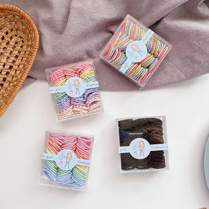 Banda de goma cuerda de pelo de las niñas elásticas altas 90 piezas Estilo coreano lindo color caramelo en caja tamaño pequeño