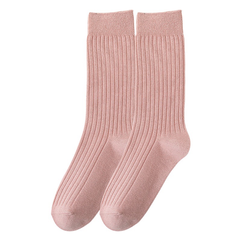 Calcetines de mujer de color sólido calcetines de media pantorrilla de primavera y otoño calcetines de pila de color caramelo de algodón peinado de mujer Zhuji calcetines largos de mujer al por mayor