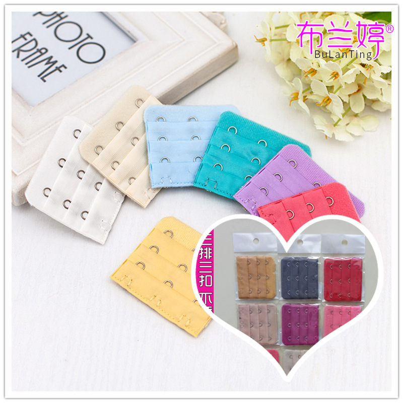 Three-row, three-button stainless steel bra extension buckle. Three-row, three-button underwear stand-alone extension buckle with width 5.6cm.