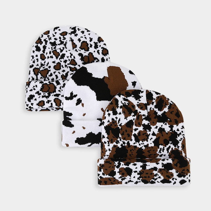 Moda europea y americana Nueva leopardo Jacquard sombrero de punto engrosado cálido hombres y mujeres otoño e invierno Gran circunferencia de la cabeza protección del oído sombrero de lana