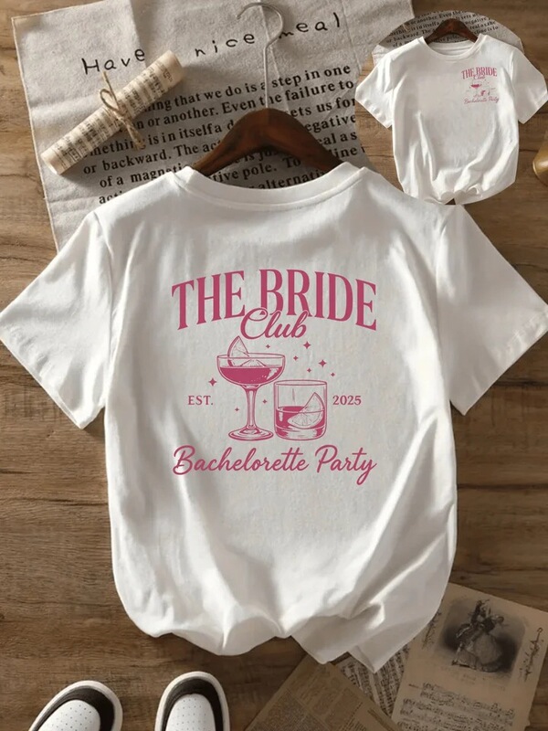 Women's "Bride Club" Graphic T-Shirt in White with Pink Lettering and Wine Glass Design, Perfect for Spring Women's "Bride Club" Graphic T-Shirt in White with Pink Lettering and Wine Glass Design, Perfect for Spring