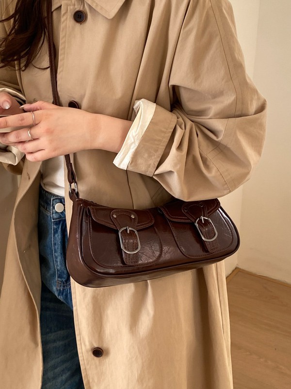Retro versátil hombro explosivo nicho bolsos debajo de la axila mujeres 2026 ventas calientes nuevas lujosas de moda alta sensación de backpack